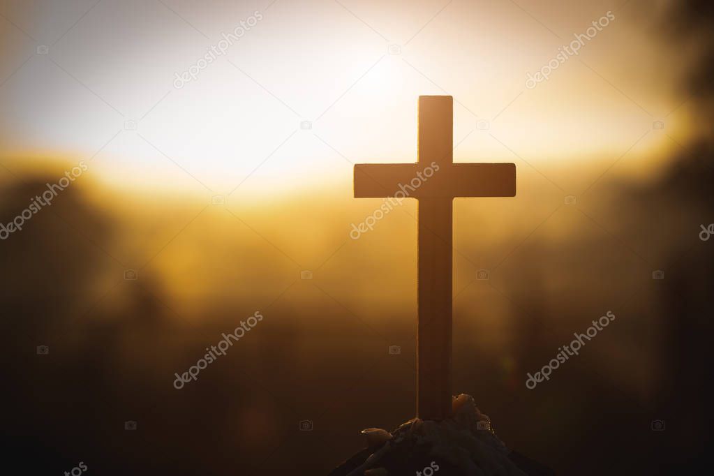 Christ Jesus  cross in the sunrise colored sky background, Worsh