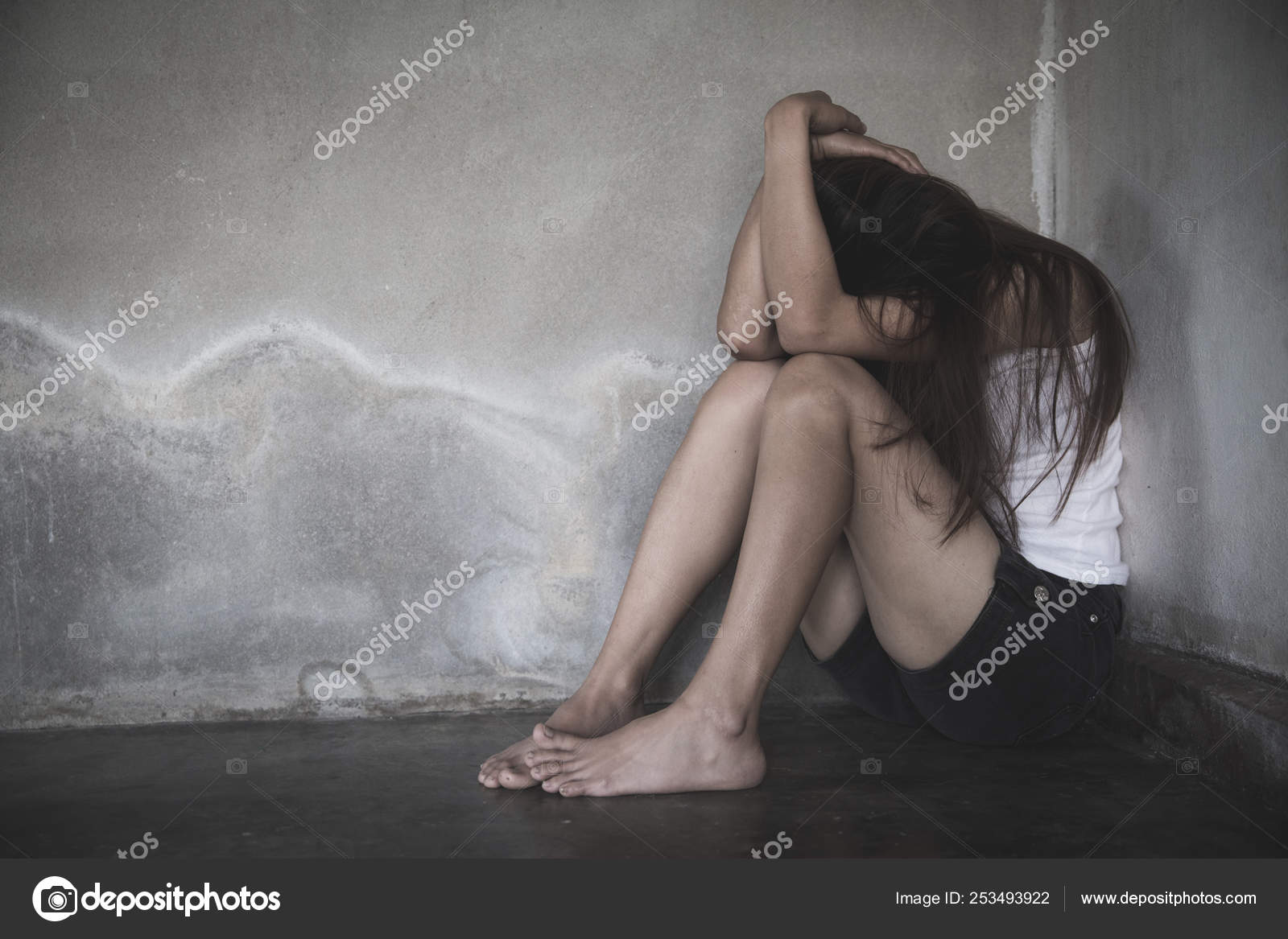A Woman Lying Down on the Floor Looking Depressed · Free Stock Photo