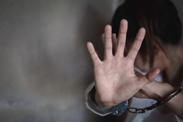 Woman's hands in handcuffs, Stop violence against Women,  human