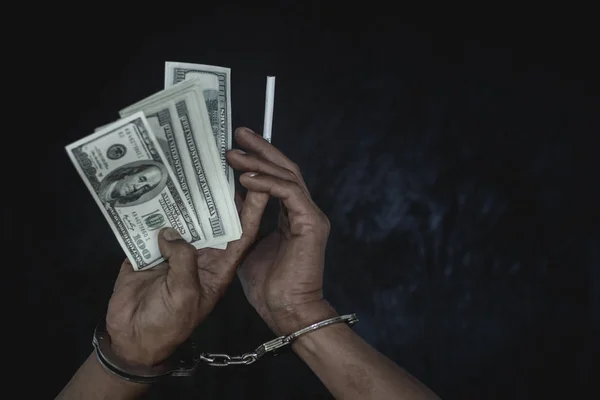 Hand young man in handcuffed hold money, Police arrest drug traf — Stock Photo, Image
