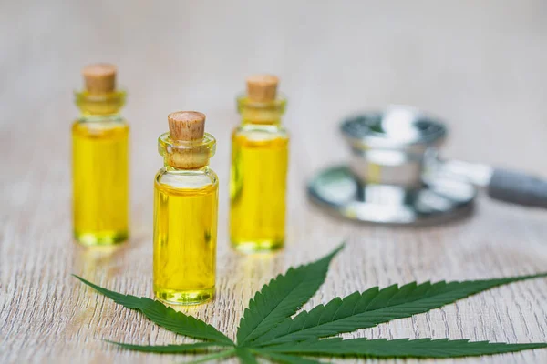 Hemp oil, Marijuana oil bottle, cannabis oil extracts in jars, m — Stock Photo, Image