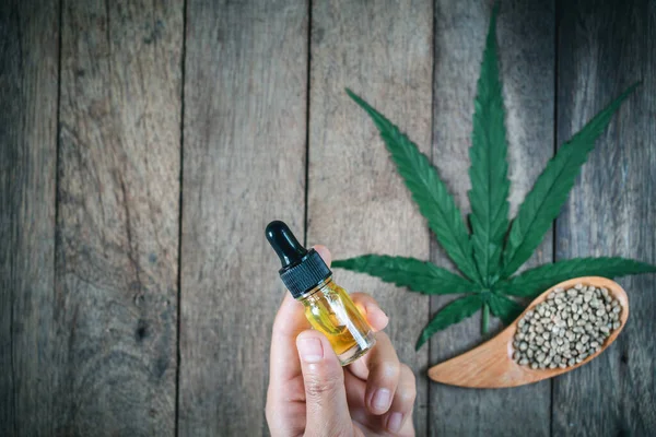 Cbd Cannabis Oil Hemp Product Hand Holding Bottle Cannabis Oil — Stock Photo, Image