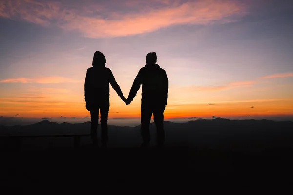Silhouette Of A Man And Woman Holding Hands With Each Other With A Beautiful Sunset In Background Happy Lifestyle Concept Boyfriend Romantic Stock Photo
