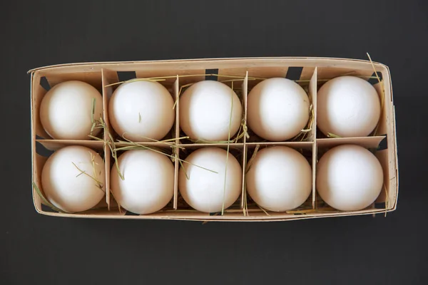 Chicken eggs in the package, top view
