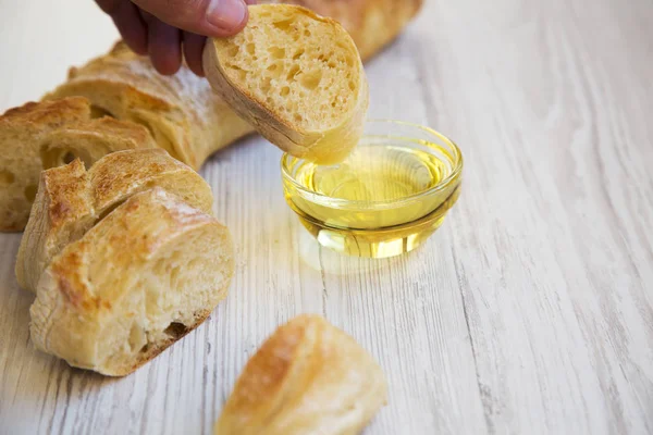 Male Hand Wetting Italian Baguette Oil Side View Closeup — Stock Photo, Image