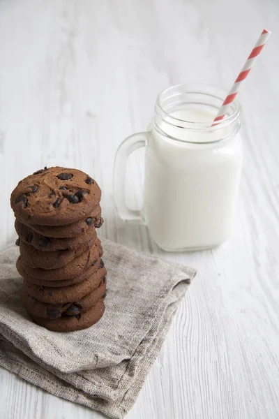 Side View Chocolate Chip Cookies Jar Milk White Wooden Table — Stock Photo, Image