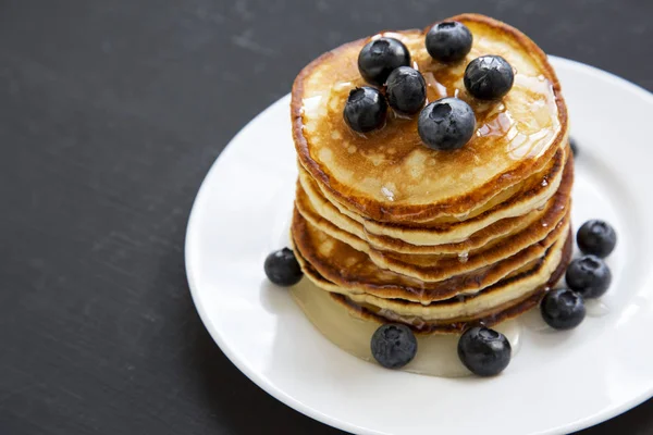 Pancakes Blueberries Honey White Plate Black Wooden Background Side View — Stock Photo, Image