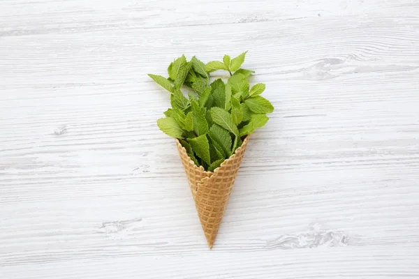 Waffle Sweet Cone Mint Leaves White Wooden Surface Flat Lay — Stock Photo, Image