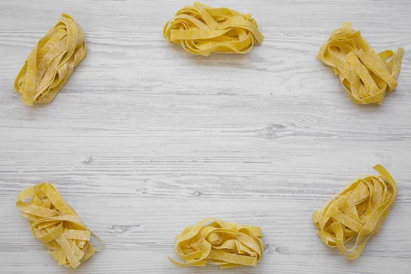 Frame Raw Pasta Pappardelle White Wooden Background Space Text — Stock Photo, Image