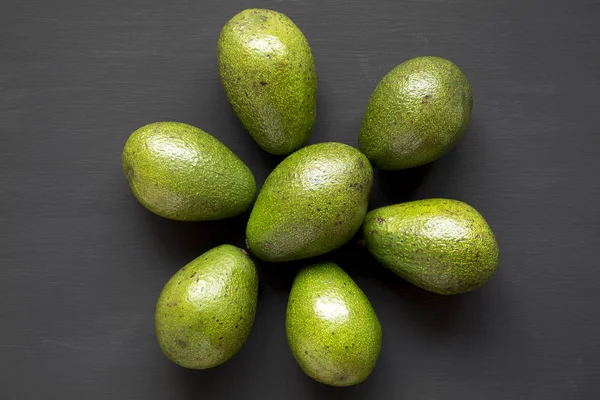 Whole Avocados Dark Wooden Surface Top View Overhead — Stock Photo, Image