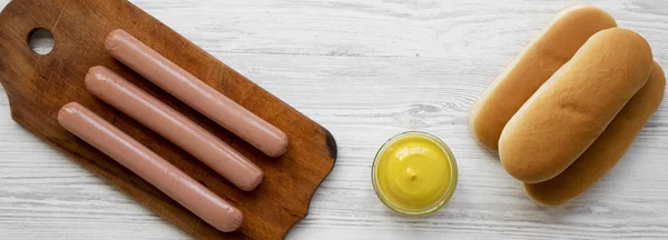 Hotdog Ingredients Sausages Rustic Wooden Board Hot Dog Buns Mustard — Stock Photo, Image