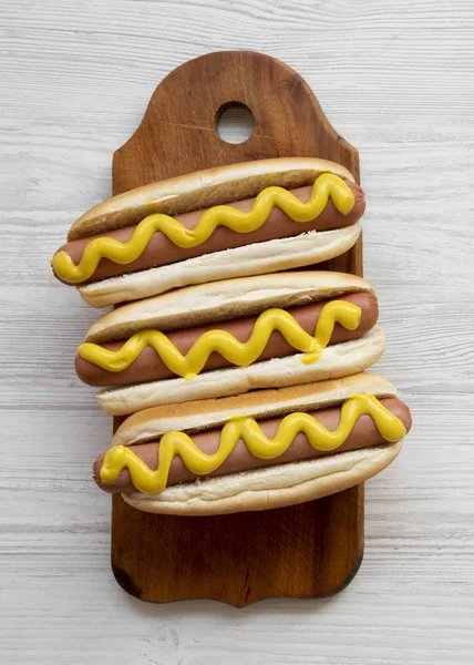 Hotdog Yellow Mustard Rustic Board White Wooden Surface Top View — Stock Photo, Image