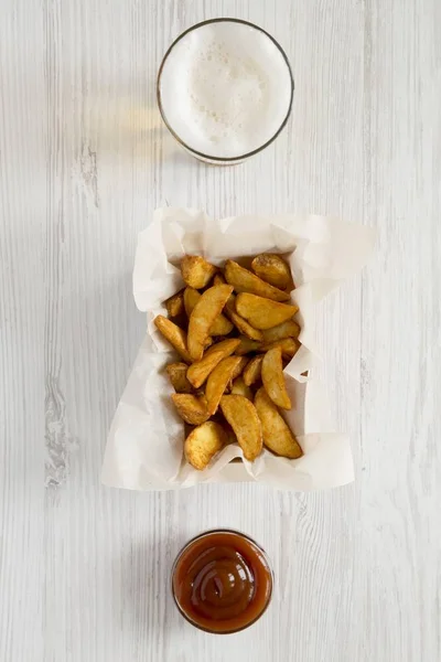 Fried Potato Wedges Paper Box Barbecue Sauce Glass Beer White — Stock Photo, Image