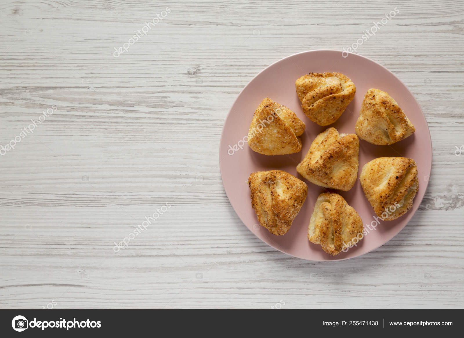 Top View Homemade Cottage Cheese Biscuits On Pink Plate Over Wh