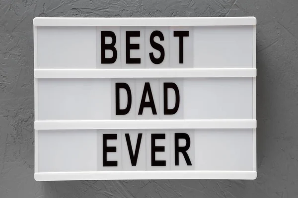 "best dad ever" Worte auf Leuchtkasten über grauer Oberfläche, Draufsicht. o — Stockfoto