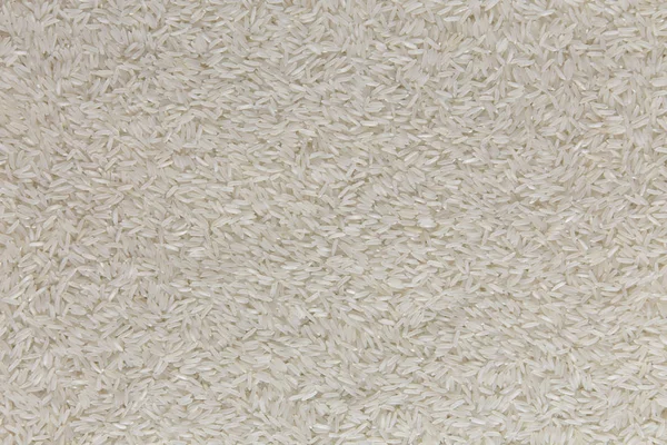 Basmati de arroz blanco seco, vista superior. Acostado plano, arriba, desde arriba — Foto de Stock