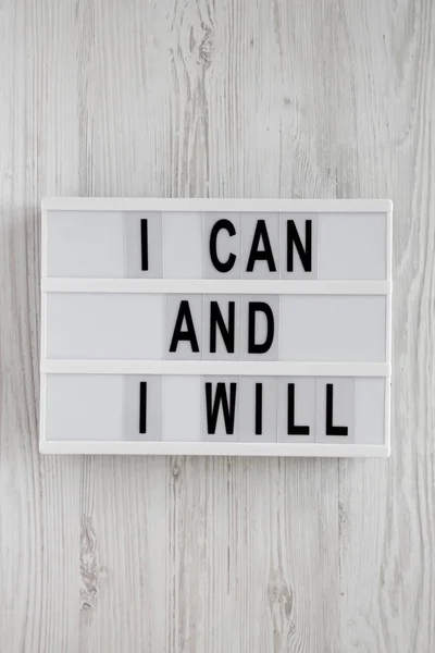 'I can and I will' words on a modern board over white wooden bac — 스톡 사진