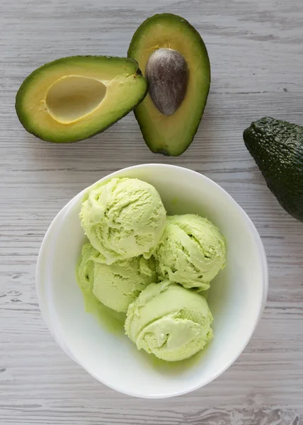 Homemade tasty avocado ice cream in a bowl, view from above. Ove