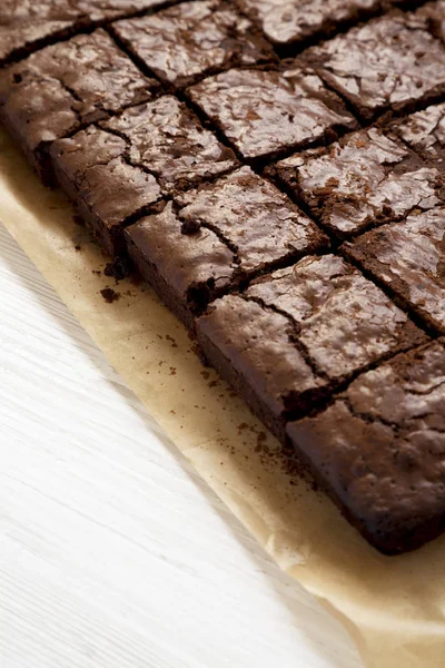 Homemade chocolate brownies, side view. Copy space. — Stock Photo, Image