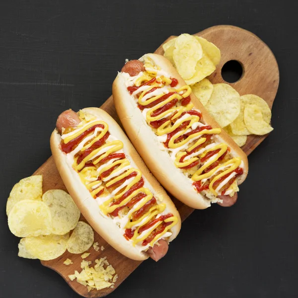 Homemade colombian hot dogs with pineapple sauce, yellow mustard