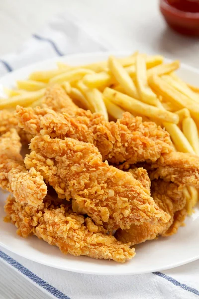 Homemade Crispy Chicken Tenders French Fries White Plate Side View Stock Picture