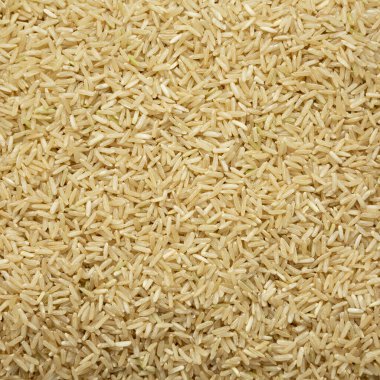 Dry Brown Rice arka planı, üst manzara. Yukarıdan, dümdüz uzanmış. 