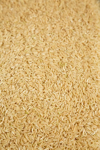 Dry Brown Rice Background Side View — Stock Photo, Image