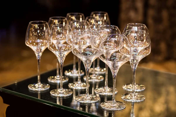 empty glasses for champagne on a buffet table