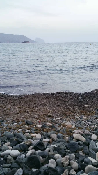 Vue sur une plage au coucher du soleil — Photo