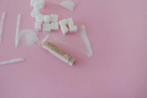 Scene recreating drugs with white sugar on pink background — Stock Photo, Image