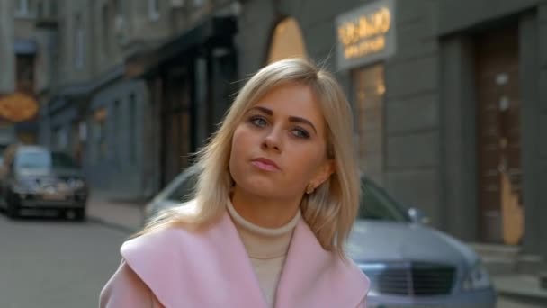 Young Attractive Blonde Woman Pink Coat Stands Street Modern City — Stock Video