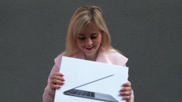 Young Attractive Blonde Woman Pink Coat Shopping Lady Holds Laptop — Stockvideo