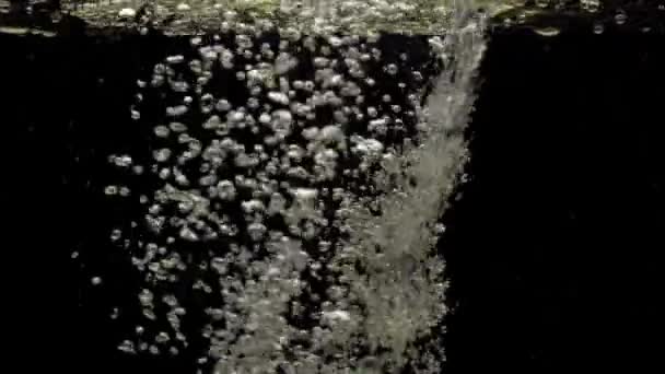 Numerous Small Air Bubbles Penetrate Crystal Clear Water Mixing Rise — ストック動画