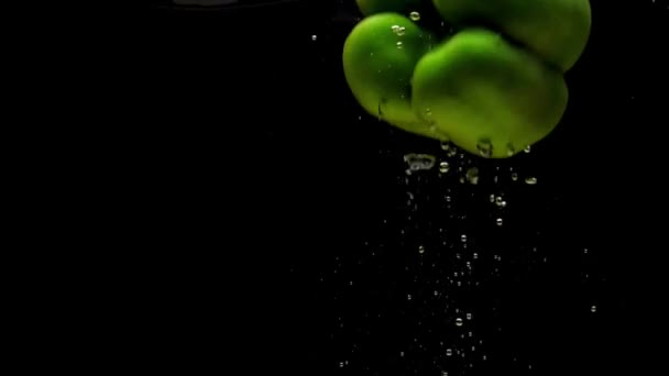 One Green Paprika Falling Transparent Water Black Background Fresh Organic — Stock Video