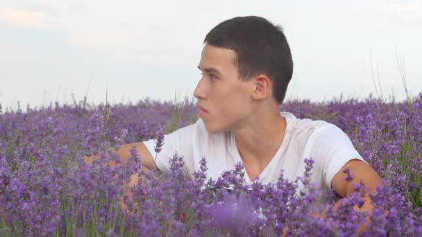 Unhappy Depressed Young Teen Portrait Lonely Brunette Boy Alone Lavender — Stock Video