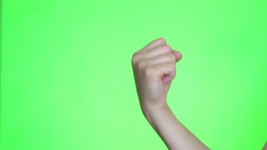 Yumruk pompa. Kazanma bir hedef. Yumruk yakın çekim. Chroma anahtar arka plan. Yeşil ekran. İzole