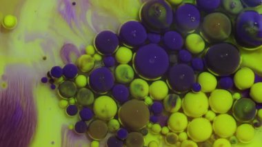 Soyut renkli doku. Sarı ve mor mürekkep. Galaksiler ve gezegenler hatırlatmak hipnotik çok renkli desenler