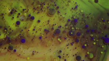 Soyut renkli doku. Sarı ve mor mürekkep. Galaksiler ve gezegenler hatırlatmak hipnotik çok renkli desenler