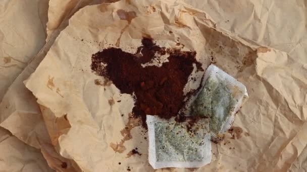 Using Coffee and Tea for Composting. Coffee, grounds, and used tea bags are great additions to the garden or compost — Stock Footage Using Coffee Tea Composting Coffee Grounds Used Tea Bags Great Stock Video