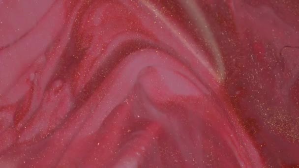 粉红色 酒红色 红色闪闪发光的液体化妆品质地 闪闪发光的装饰艺术化妆美容产品 指甲油或眼影 油漆运动和混合 — 图库视频影像