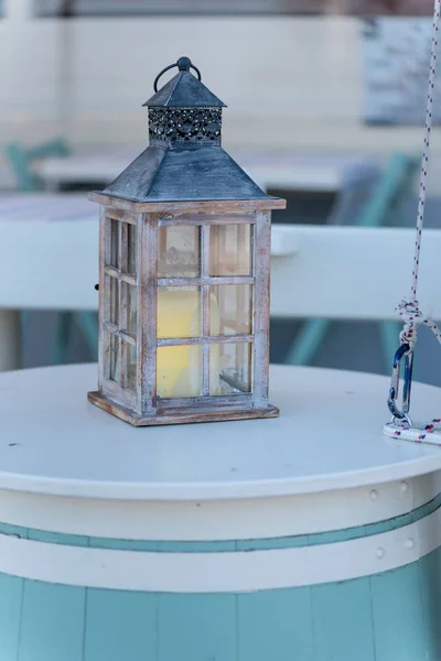 Wooden lamp with candle