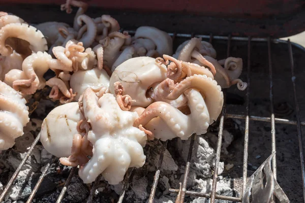 Cooking the grilled polyps — Stock Photo, Image