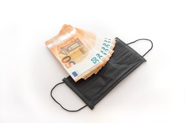 Covid-19 maskeler ve para