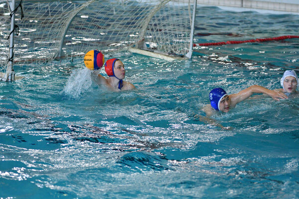 Orenburg, Russia - May 4, 2017 years: the boys play in water polo at the city water polo tournament