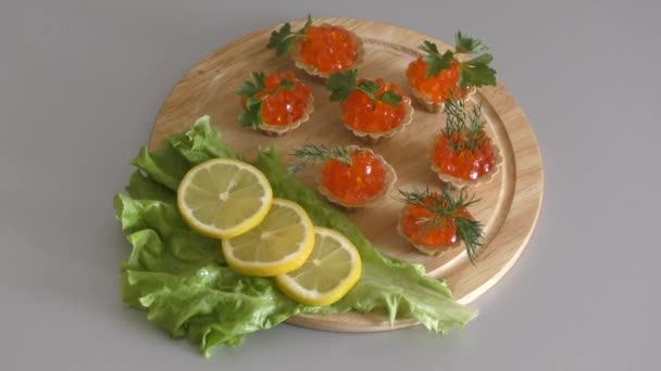 Tartlets Red Caviar Cutting Board — Stock Video