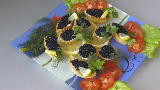 Tartlets with black caviar and fresh greens — Stock Footage Tartlets Black Caviar Fresh Greens Royalty Free Stock Video