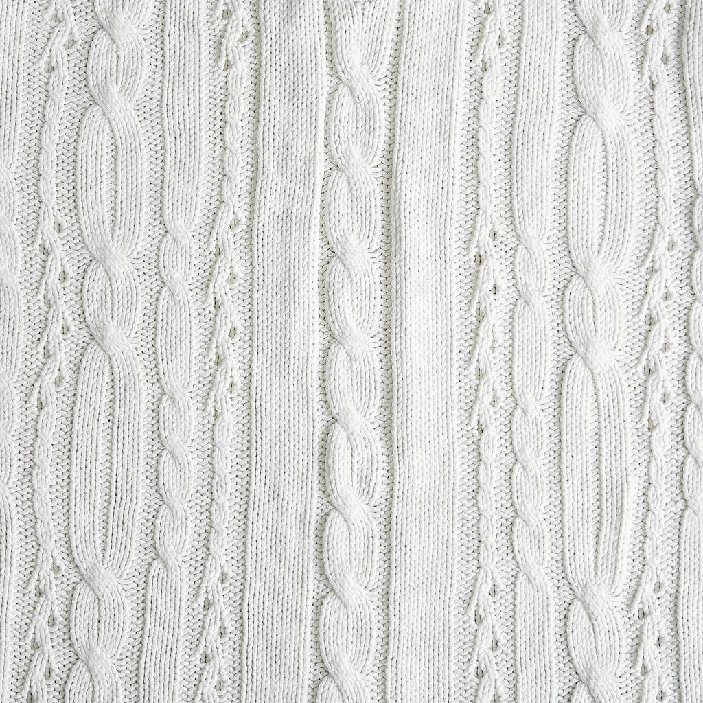White ivory Knitted Fabric Texture. Handmade sweater, background, copy space.