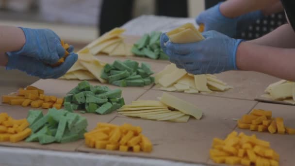 Catering prepearing a lot of cheese plates — Stock Video