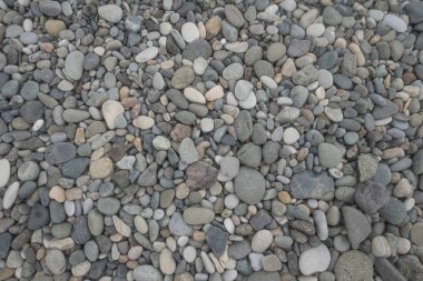 güneşli bir gün soyut desen doku arka plan üzerinde sahilde çakıl