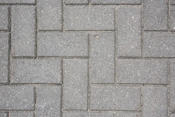 Бетонна плитка на першому тротуарі абстрактний візерунок текстура фону крупним планом — стокове фото